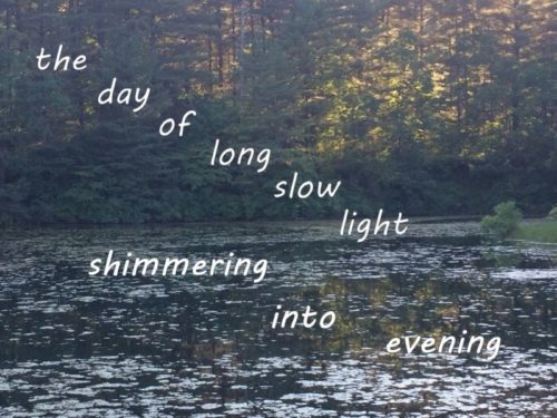 the day of long slow light shimmering into evening